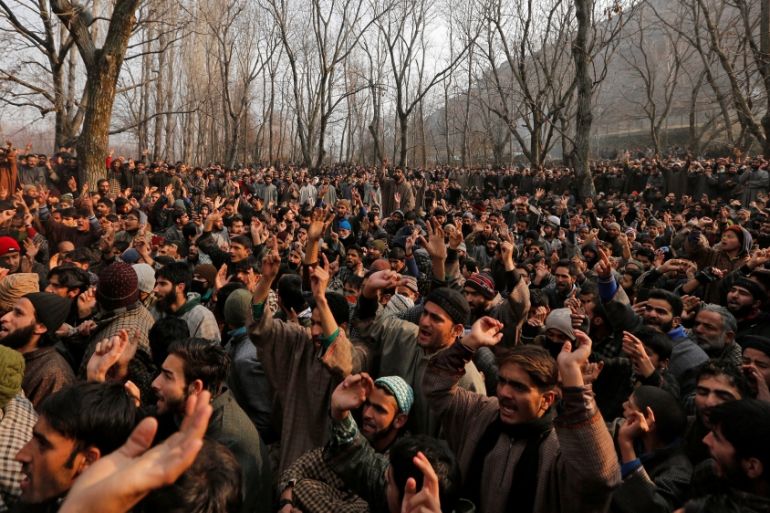 People shout slogans as they gather during the funeral of Fardeen Ahmad Khandey, a suspected militant who according to local media was killed in a gunbattle with Indian security forces