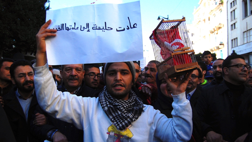 Wadii Jlassi was among the many Popular Front supporters marching in Tunis [Jillian Kestler-D'Amours/Al Jazeera]