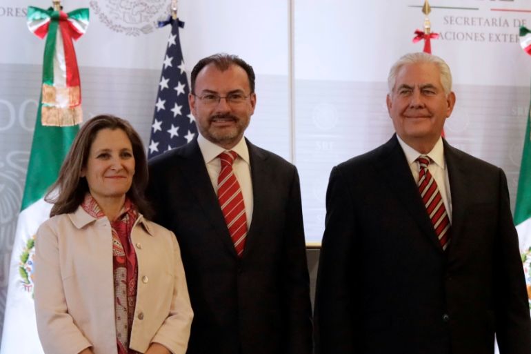 Canadian Foreign Minister Chrystia Freeland, Mexican Foreign Minister Luis Videgaray and U.S. Secretary of State Rex Tillerson pose for a picture after a news conference in Mexico City