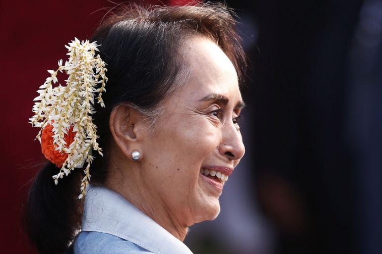Myanmar''s State Counsellor Aung San Suu Kyi smiles as she attends the "At Home" reception at the Rashtrapati Bhavan presidential palace after the Republic Day parade in New Delhi