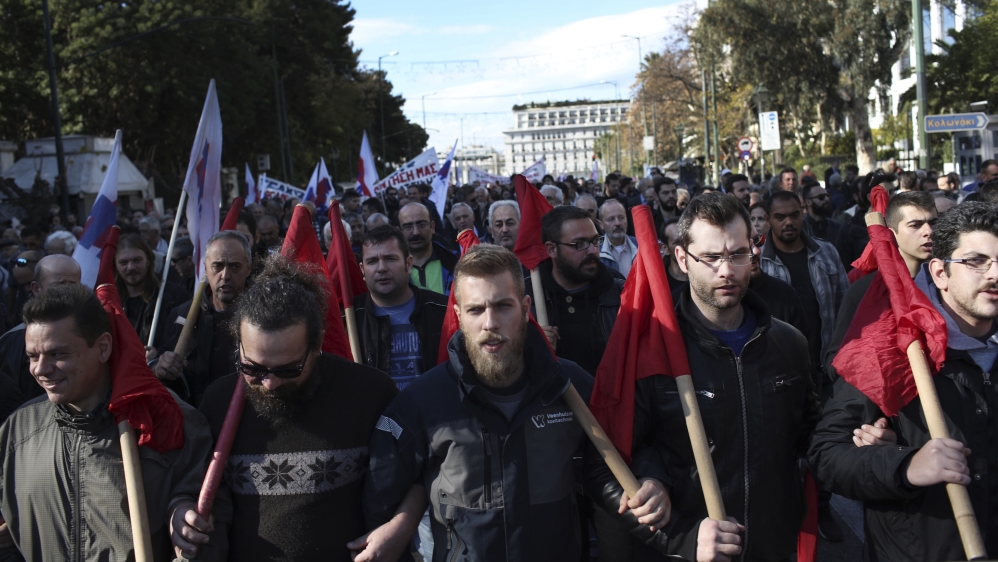 Protesters march against austerity policies [Petros Giannakouris/AP Photo]