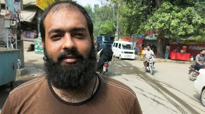 Waqas Jamshed, PTI voter and restaurant owner [Asad Hashim/Al Jazeera]
