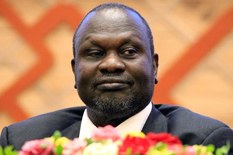 FILE PHOTO: South Sudan rebel leader Riek Machar Kiir attends the signing in Khartoum, Sudan of an accord with the South Sudan government aimed at ending the country''s civil war