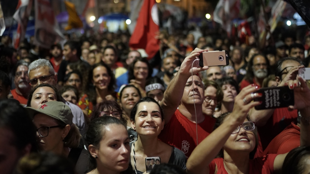 Supporters of presidential candidate for the Workers' Party, Fernando Haddad, during a campaign in downtown Rio de Janeiro [Leo Correa/AP] 
