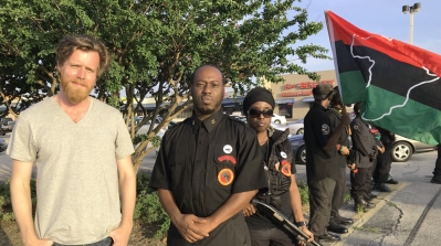 Gannon and members of The People's New Black Panther Party's defence arm, the Huey P. Newton Gun Club. The party has a message of separation and do not want to live with white America [Al Jazeera]