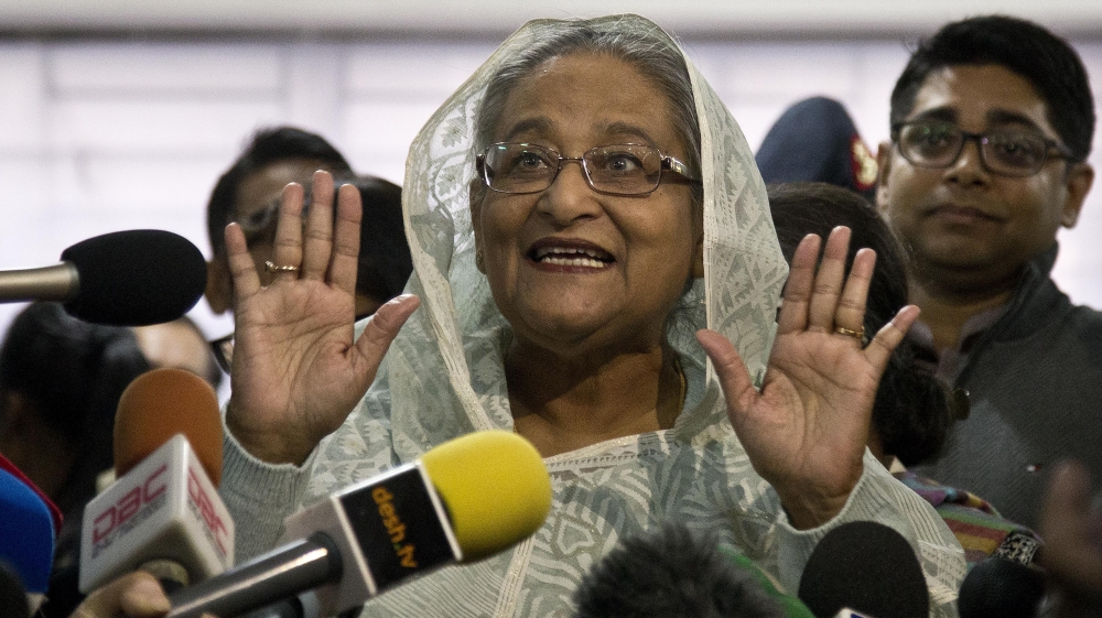 Bangladesh Prime Minister Sheikh Hasina speaks to the media persons after casting her vote in Dhaka [Anupam Nath/AP Photo]