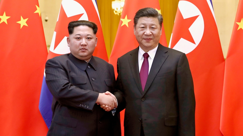 Kim and Xi met three times last year [File: Ju Peng/Xinhua via The Associated Press]