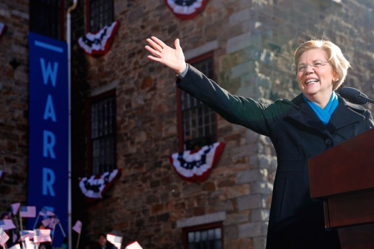 Potential 2020 Democratic presidential nomination candidate U.S. Senator Elizabeth Warren (D-MA) waves at the crowd ahead of a campaign rally in Lawrence