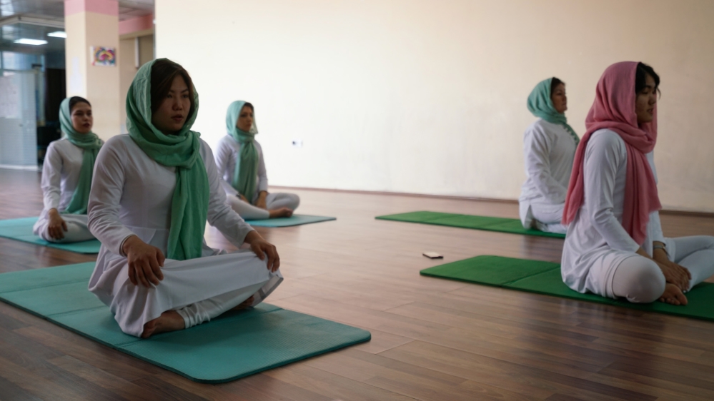 Fakhria says that yoga can help people in Afghanistan cope with the trauma caused by years of conflict [Sorin Furcoi/Al Jazeera]