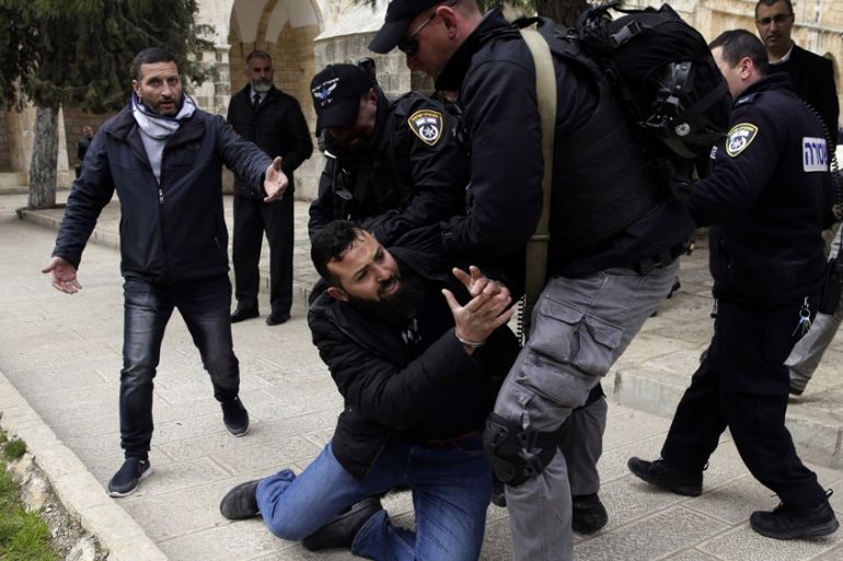 Israeli police arrests aPalestinian at al Aqsa mosque compound in Jerusalem, Monday, Feb. 18, 2019. Israeli police officers have arrested several Palestinians for "causing a disturbance"