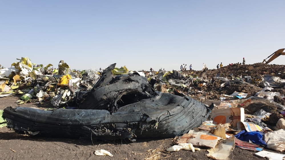 Accident investigators from across the world have descended on the crash site [Hamza Mohamed/Al Jazeera]