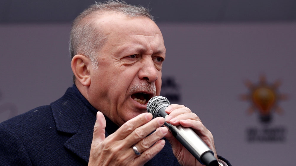 Erdogan addressed his supporters during a rally for the local elections in Istanbul on March 30 [Murad Sezer/Reuters]