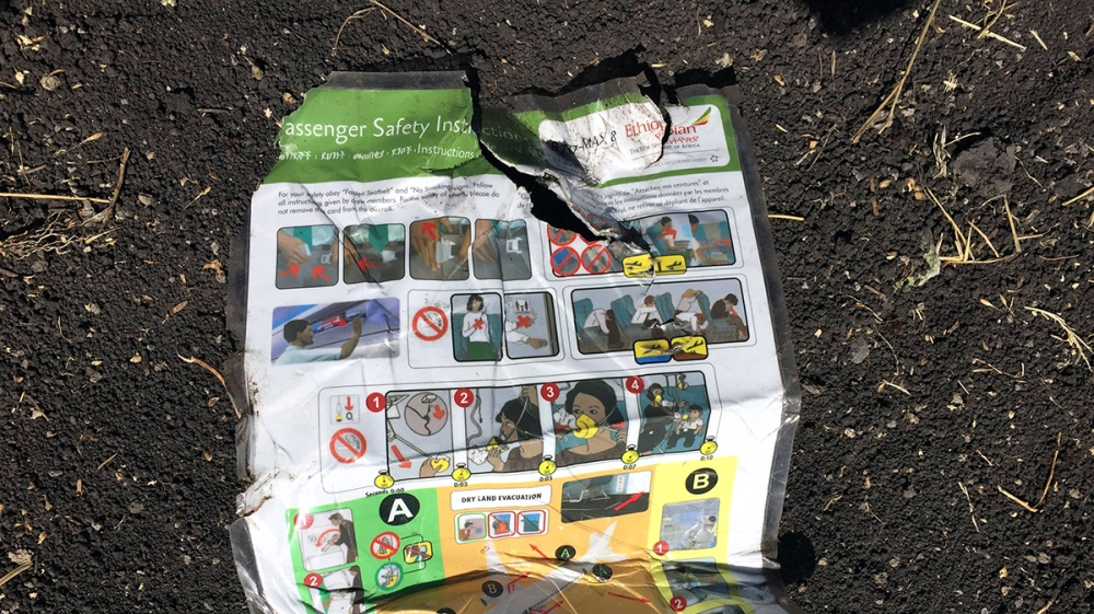 A passenger safety instruction card seen at the scene of the crash [Tiksa Negeri/Reuters]