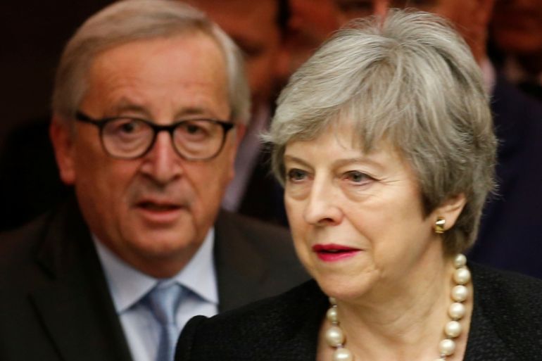 British Prime Minister Theresa May and European Commission President Jean-Claude Juncker arrive for a news conference in Strasbourg