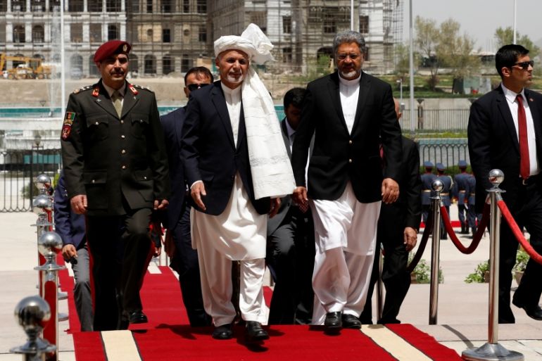 Afghan President Ashraf Ghani arrives at the inauguration of the newly-elected parliament in Kabul