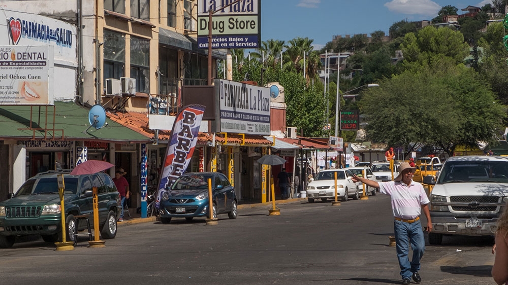Many pharmacies and dentist office line the streets near the port of entry in Nogales, Mexico [Eline van Nes/Al Jazeera]