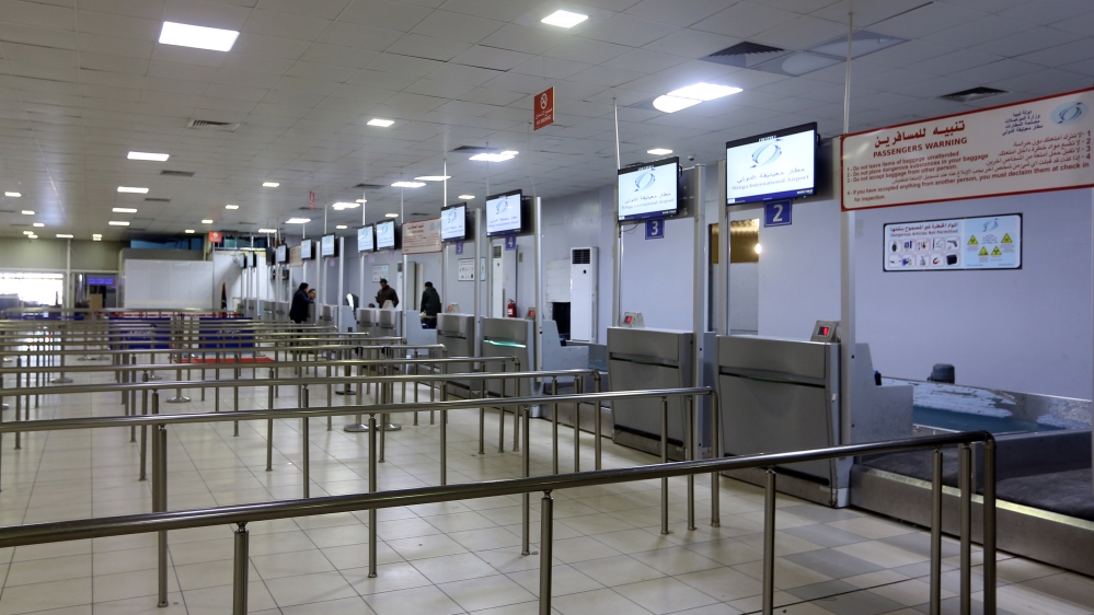 The empty Mitiga International Airport after services were temporarily suspended [Mahmud Turkia/AFP]
