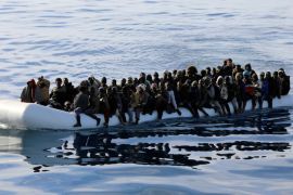 Migrants are seen in a rubber dinghy in the Mediterranean Sea off the coast of Libya, January 15, 2018 [Hani Amara/Reuters]
