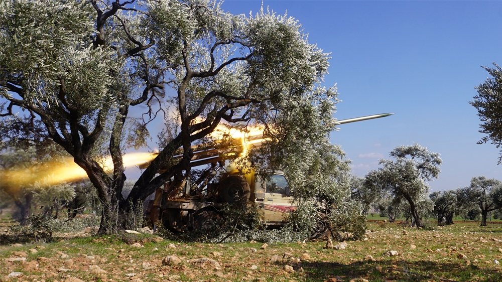 SYRIA-CONFLICT-IDLIB  Members of Syria's opposition National Liberation Front remotely-fire a rocket at a position near the village of al-Nayrab, about 14 kilometres southeast of the city of Idlib 