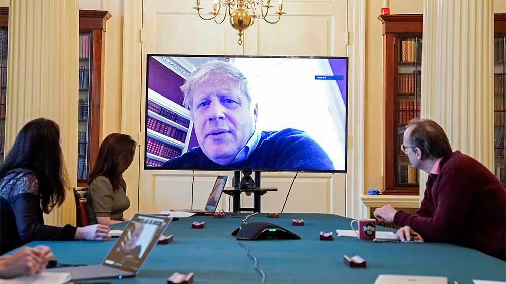 A handout picture released by 10 Downing Street, the office of the British prime minister on March 28, 2020, shows an image of Britain's Prime Minister Boris Johnson on a screen as he remotely chairs 
