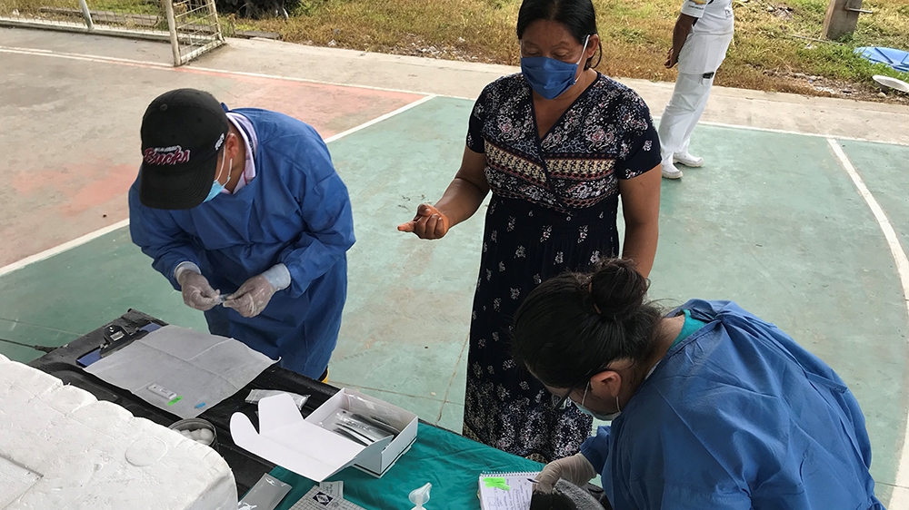 A member of the Siekopai nation of San Pablo Community wearing a protective face mask is tested for antibodies of the coronavirus disease (COVID-19), at the territories of the Siekopai nation in Sucum