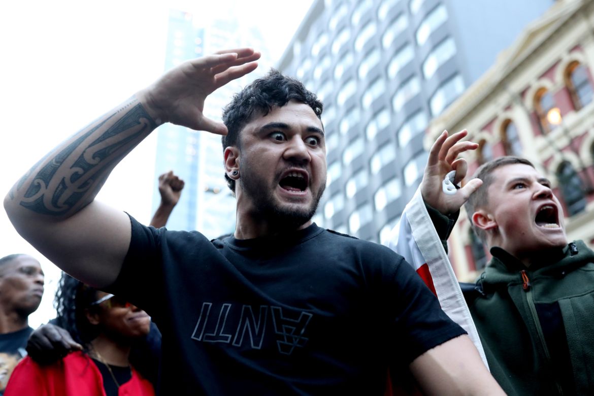 AUCKLAND, NEW ZEALAND - JUNE 01: Protestors perform a haka after marching down Queen Street on June 01, 2020 in Auckland, New Zealand. The rally was organised in solidarity with protests across the Un