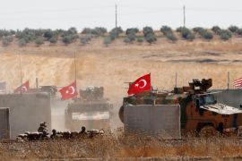 Turkish troops return after a joint US-Turkey patrol in northern Syria, as seen from near the Turkish town of Akcakale, Turkey, on September 8, 2019 [Reuters/Murad Sezer]