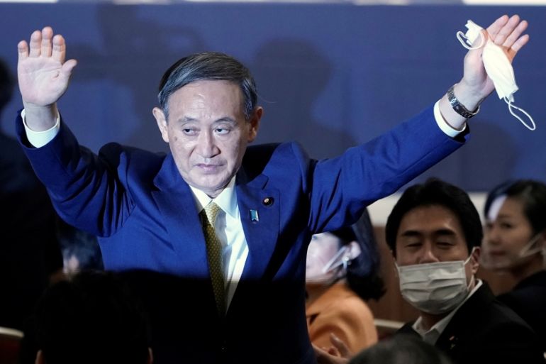 Japanese Chief Cabinet Secretary Yoshihide Suga gestures as he is elected as new head of the ruling party at the Liberal Democratic Party''s (LDP) leadership election in Tokyo, Japan September 14, 2020