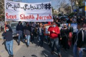 Palestinian, Israeli, and foreign activists demonstrate against Israeli occupation and settlement activity in the Palestinian territories [File: Ahmad Gharabli/AFP]