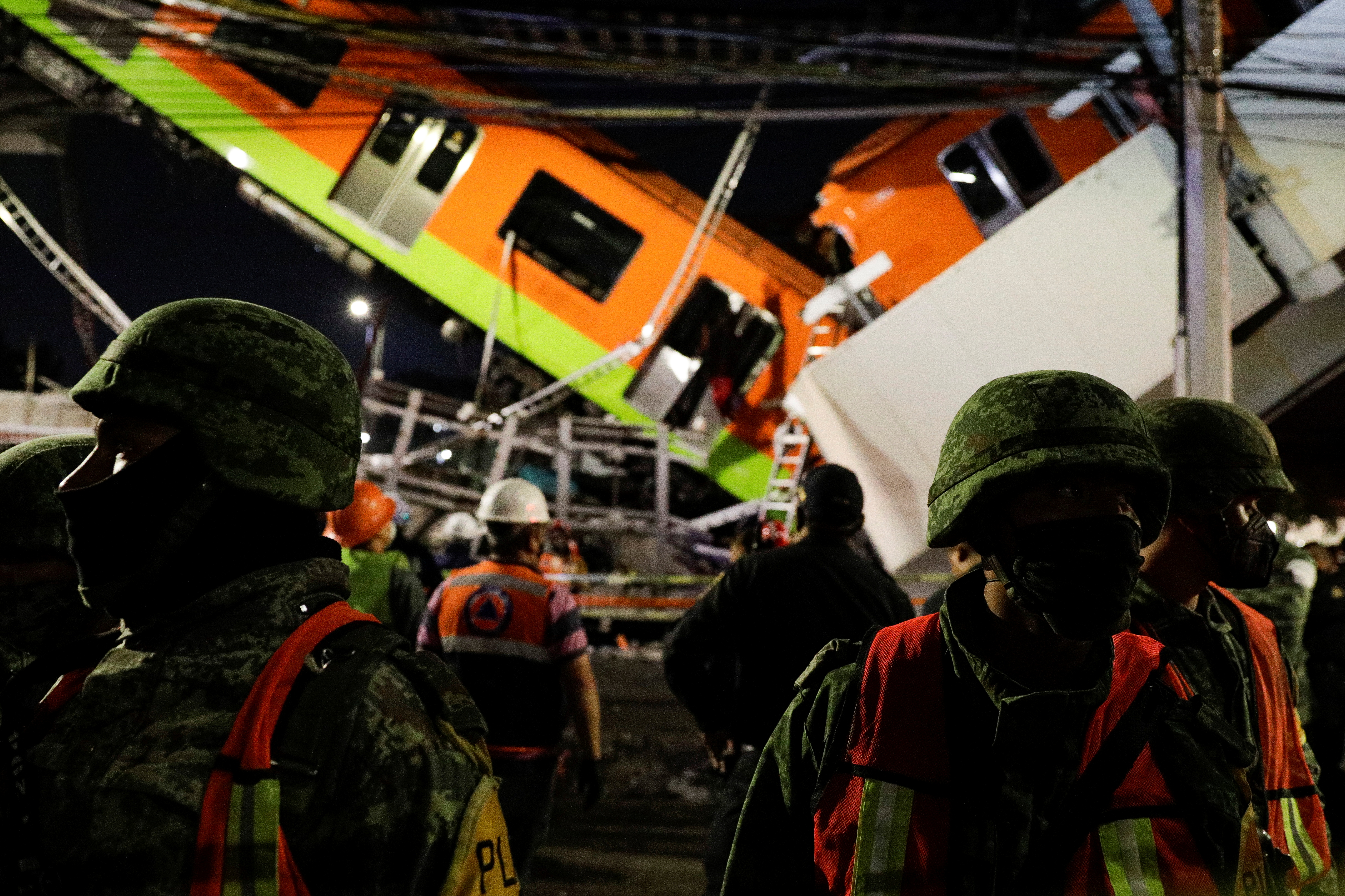 At least 15 dead after Mexico City metro overpass collapses onto road