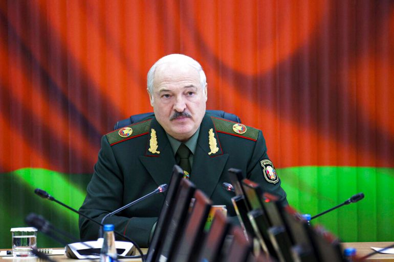 Belarusian President Alexander Lukashenko attends a meeting with top level military officials in Minsk, Belarus, Monday, Nov. 22, 2021. (Nikolay Petrov/BelTA Pool Photo via AP)