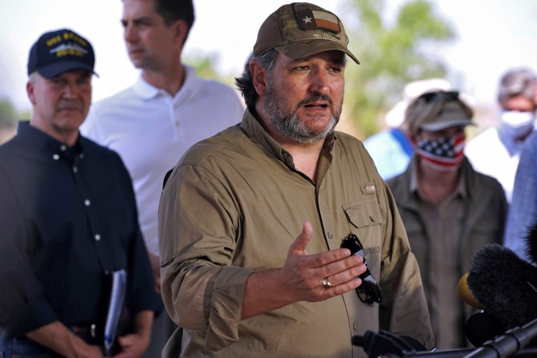 Texas Senator Ted Cruz and other members of a Republican delegation attend a press conference after a tour around a section of the U.S.-Mexico border on a Texas Highway Patrol vessel in Mission, Texas.