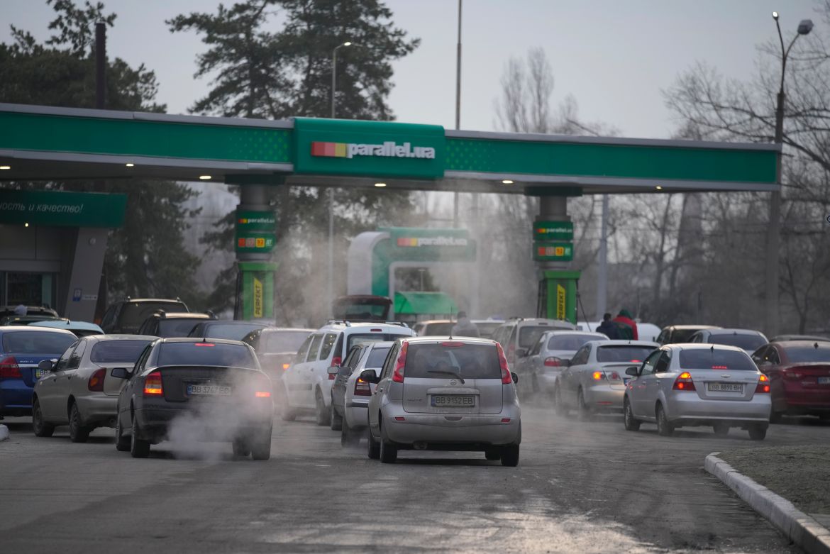 People queue for fuel at a gas station in Sievierodonetsk, the Luhansk region