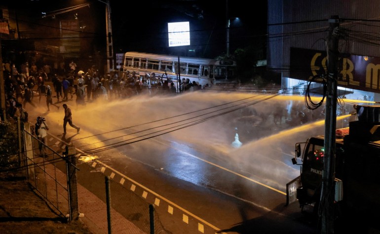 The police disperse demonstrators near Sri Lankan President Gotabaya Rajapaksa's residence