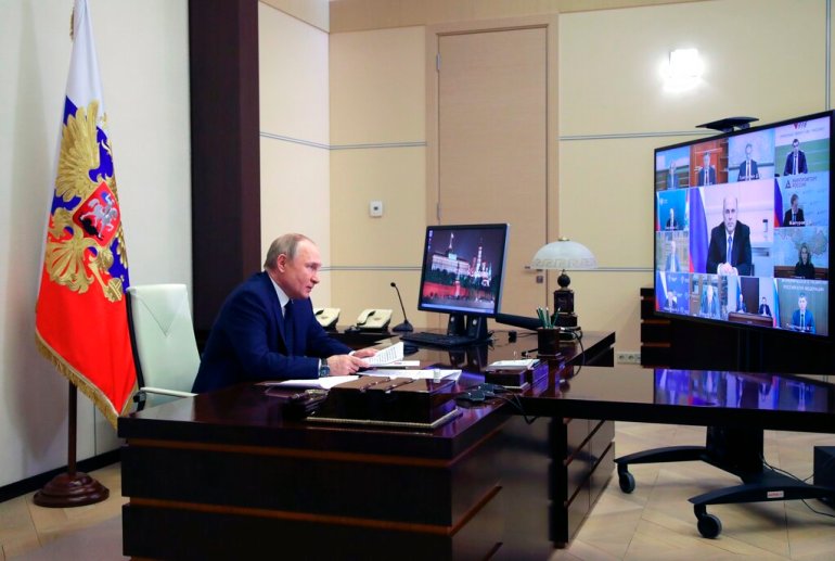 Russian President Vladimir Putin attends a cabinet meeting via videoconference at the Novo-Ogaryovo residence outside Moscow.