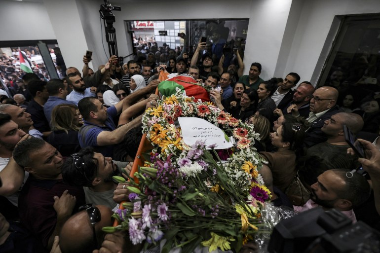 Abu Akleh's coffin being carried