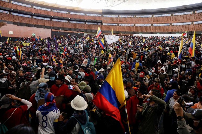 Demonstrators attend a meeting with indigenous leaders before an anti-government protest 