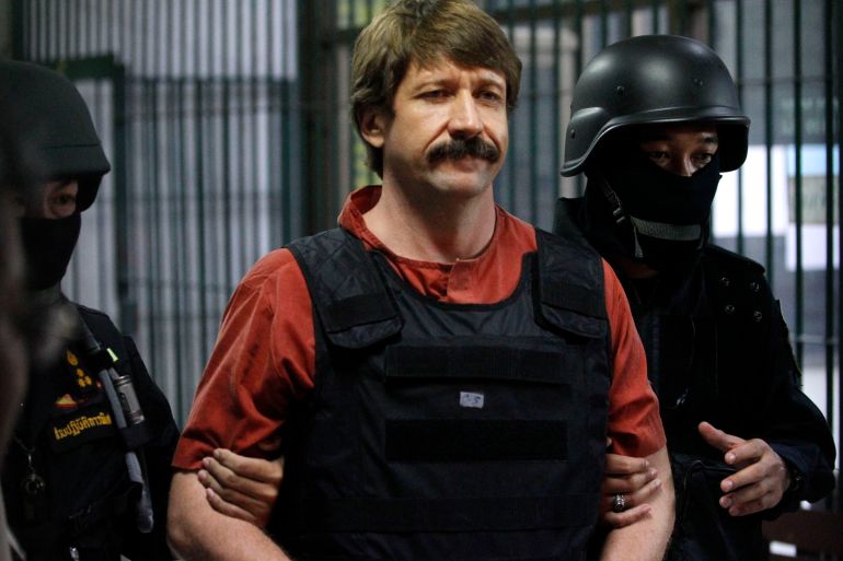 Suspected Russian arms dealer Viktor Bout is escorted by members of a special police unit after a hearing at a criminal court in Bangkok October 5, 2010. A Thai court on Tuesday dismissed charges of money-laundering and wire fraud against Bout, bringing him a step closer to extradition to the United States. The 43-year-old former Soviet air force officer known as the "Merchant of Death" faces U.S. accusations of trafficking arms since the 1990s to dictators and conflict zones in Africa, South America and the Middle East . REUTERS/Sukree Sukplang (THAILAND - Tags: CRIME LAW POLITICS)