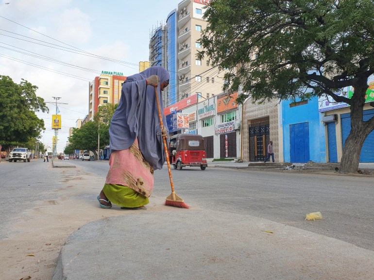 Mogadishu female street cleaners