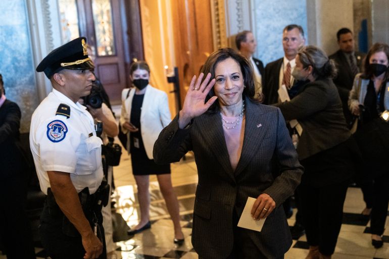 Vice President Kamala Harris waves as she departs the Senate after passage of the Inflation Reduction Act at the U.S. Capitol August 7, 2022 in Washington, DC.