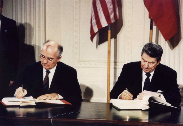 Gorbachev (left) and Reagan (right) signing the he Intermediate-Range Nuclear Forces (INF) treaty at the White House