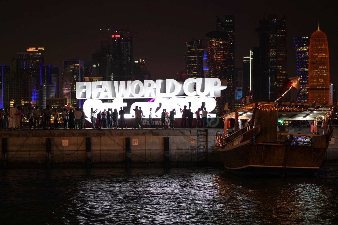 A lit up FIFA World Cup display on the waterfront in Doha