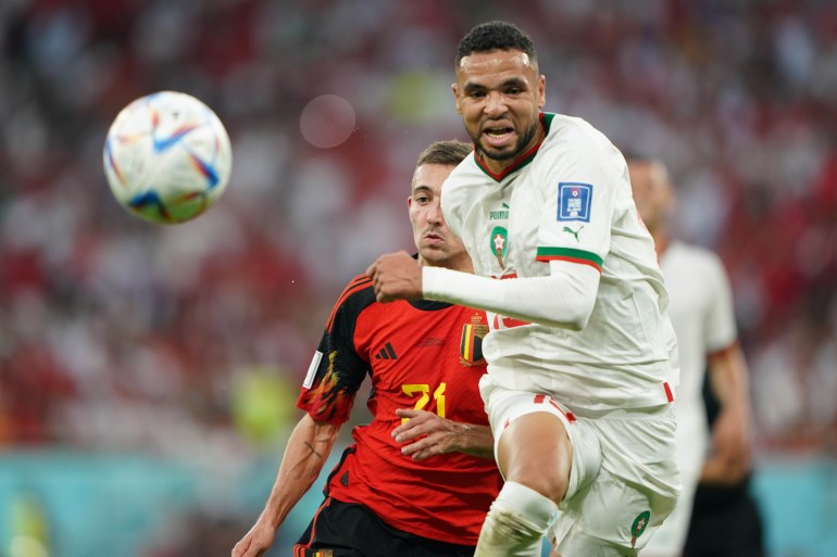 A Moroccan play runs after the ball in action against Belgium in their Group F, FIFA World Cup 2022, match on November 27, at Al Thumama Stadium in Doha, Qatar.