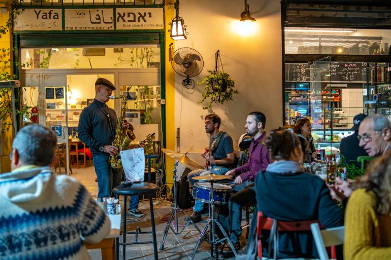 A jazz performance in front of Cafe Yafa one evening