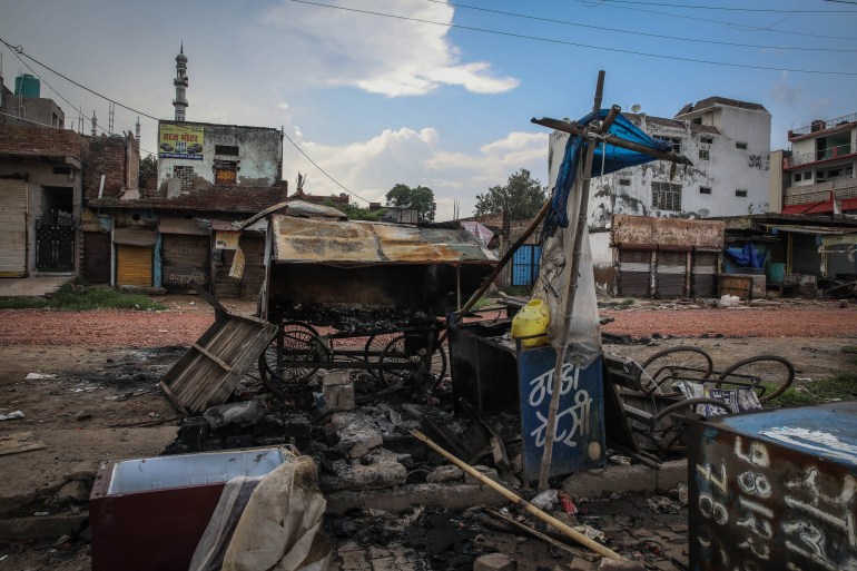 A Hindu mob attacked and burnt Muslim businesses in Sohna Haryana. [Md Meharban/Al Jazeera]