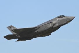 An F-35 fighter jet flies