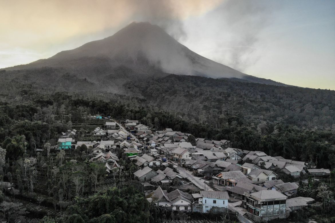 An aerial view of houses covered with volcanic ash at an area affected by the eruption of Mount Merapi volcano in Magelang, Central Java province, Indonesia, March 13, 2023.
