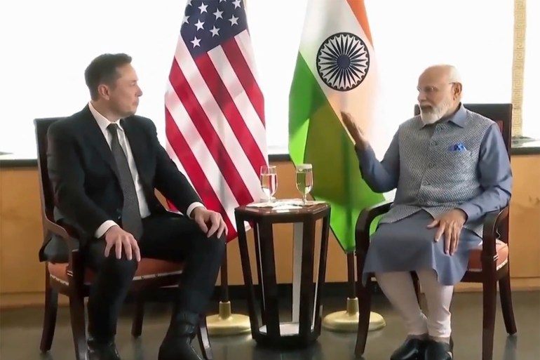 In this image made from video provided by Narendra Modi Youtube Channel, Indian Prime Minister Narendra Modi, right, meets Tesla and SpaceX CEO Elon Musk, left, during a meeting in New York, Tuesday, June 20, 2023.( Narendra Modi Youtube Channel via AP)