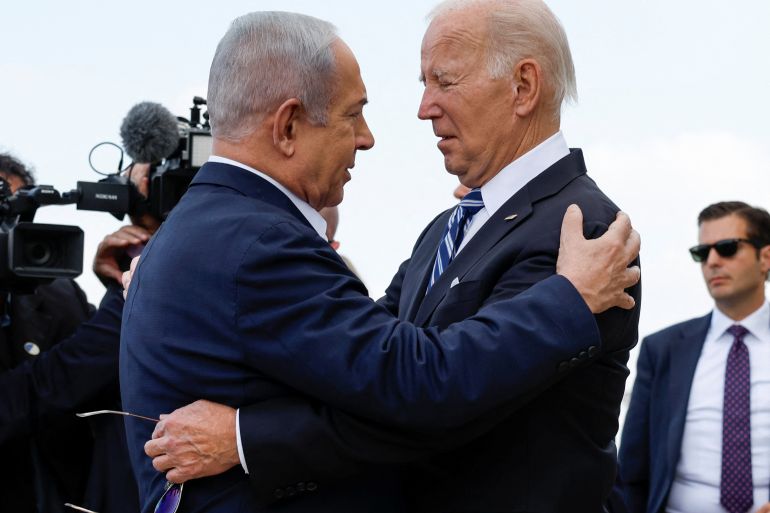 U.S. President Joe Biden is welcomed by Israeli Prime Minster Benjamin Netanyahu, as he visits Israel amid the ongoing conflict between Israel and Hamas, in Tel Aviv, Israel, October 18, 2023. REUTERS/Evelyn Hockstein