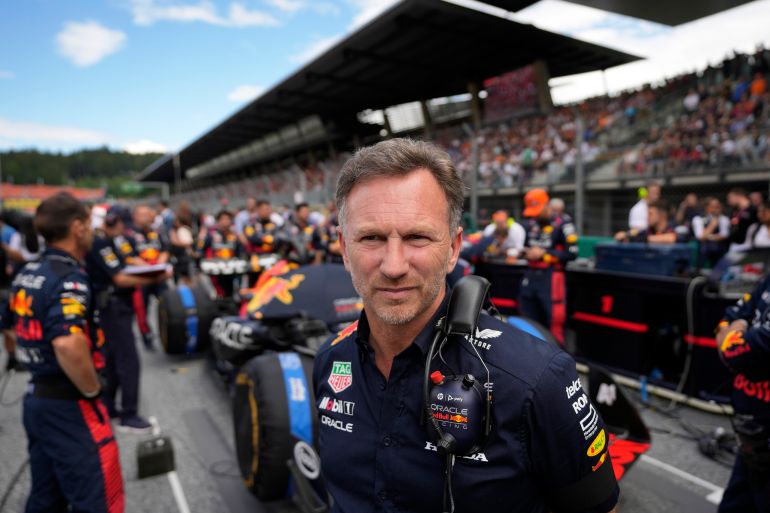 Red Bull team principal Christian Horner in racing suit